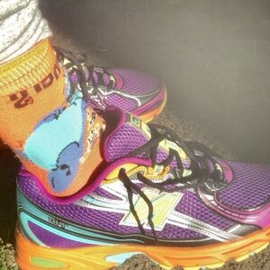 Slightly worn New Balance Purple and Orange Athletic Shoes